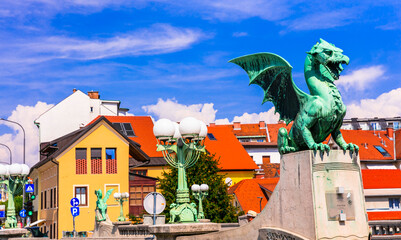 Travel and landmarks of Slovenia - beautiful Ljubljana with famous Dragon's bridge and colorful houses. - 759014414