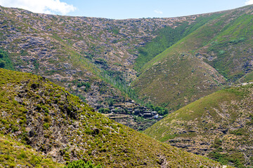 Fototapeta premium general view to the uninhabited Portuguese village of Drave inserted in the valleys of Serra da Freita. Magic village