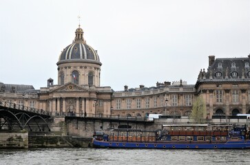 Fototapeta na wymiar Paris, France 03.24.2017: The Institut de France, French learned society, grouping five académies, the most famous of which is the Académie française