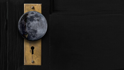 Doorway to the future. Close-up color photo of a full moon door knob on an antique vintage skeleton...