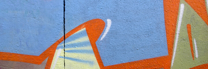 Colorful background of graffiti painting artwork with bright aerosol outlines on wall. Old school...