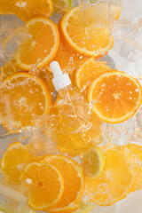 Cosmética natural a base de vitamina C, con naranjas. Frasco de sérum refrescante, hidratante...