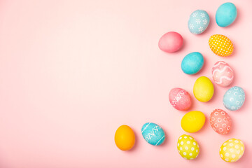 Easter eggs on a bright background. Easter celebration concept. Colorful easter handmade decorated Easter eggs. Place for text. Copy space.