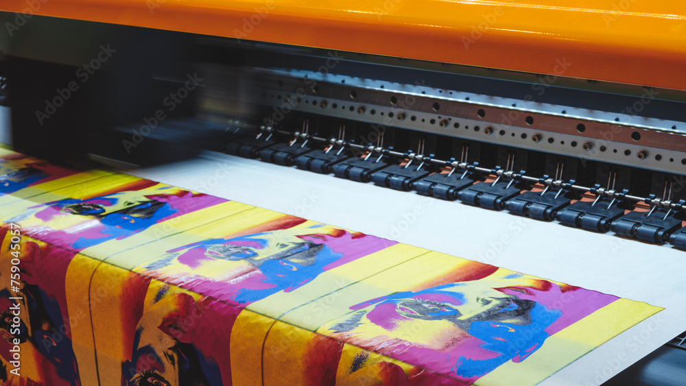 Poster A machine is printing a series of colorful images, including a portrait of a woman. The images are arranged in a row, with each one slightly different from the others
