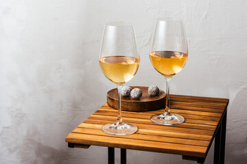 Two glasses of white wine.