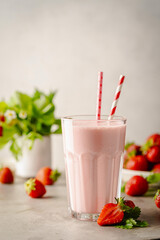 Glass of fresh strawberry milkshake