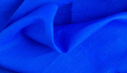 Natural cotton blue textile background. Close-up. Abstract background.