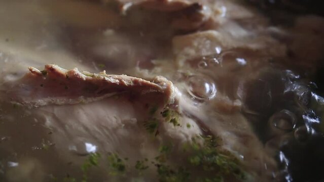 Video of chicken boiled in a pot. Food preparation concept