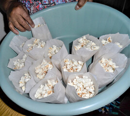 hand holding popcorn
