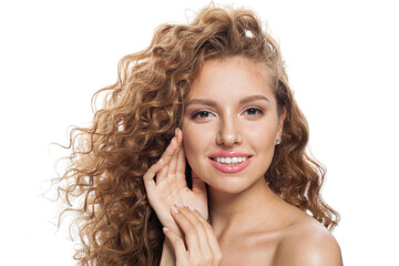 good-looking redhead woman with clean skin, curly hairstyle and natural make-up. Female model on white background