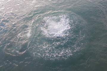 North stream explosion, underwater bubbles, gas danger, splashing liquid