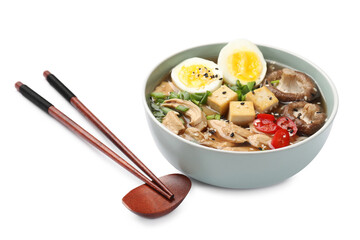 Bowl of delicious ramen and chopsticks isolated on white. Noodle soup