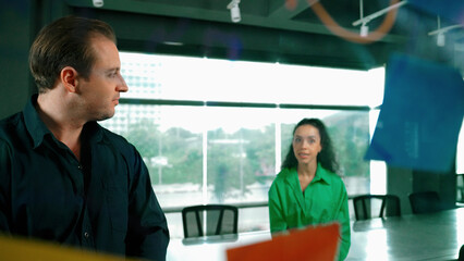 Professional business people discuss about creative marketing idea in modern office. Business team...