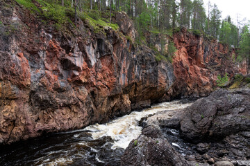 A powerful Kiutaköngäs waterfall in summery Oulanka National Park near Kuusamo, Northern Finland