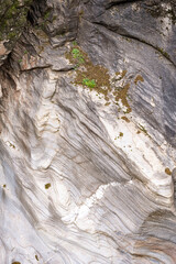 Tasyaran canyon, which attracts attention with its rock shapes similar to Antelope canyon in Arizona, offers a magnificent view to its visitors. Canyon view and stream at sunset. Usak, Turkey.