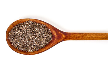 Chia seeds in a wooden spoon, isolated on white background.