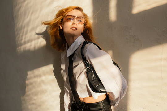 Cool blonde woman in studio 