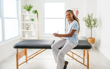 portrait of a black physiotherapy person in uniform
