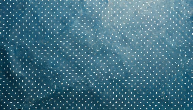 top view of blue surface with tiny white polka dot pattern for background