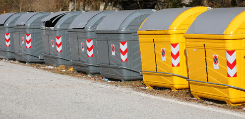 many bins for separate waste collection in the ecological area for the management material