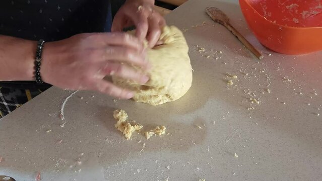 
Process of preparing ham and cheese croissants called "cachitos" in Venezuela
