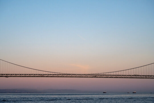 The San Francisco Bay Bridge at sunset