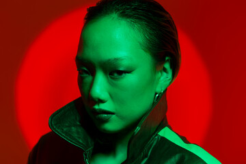 Studio portrait with red and green light