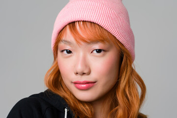 Portrait Of Girl With Orange Hair And Pink Hat