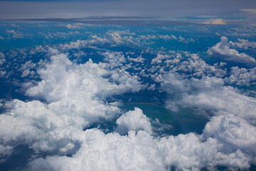 Sky view from the airplane window over Indonesia and ocean