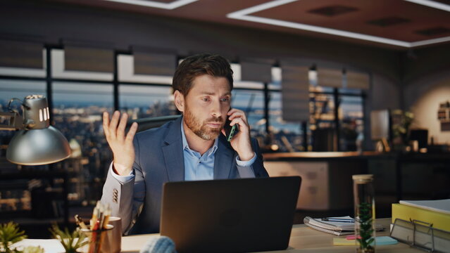 Worried Ceo Calling Phone At City View Window Office Closeup. Business Man Talk