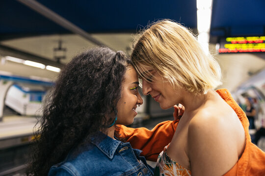 Close up of a lesbian couple in the subway