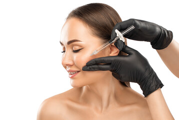 Cosmetologist does injections for lips augmentation and anti wrinkle in the nasolabial folds of a...