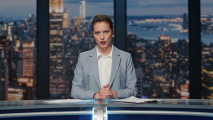 Friendly presenter reporting events at newsroom. Anchorwoman ending news release