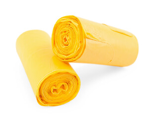 Two rolls of yellow garbage bags isolated on white