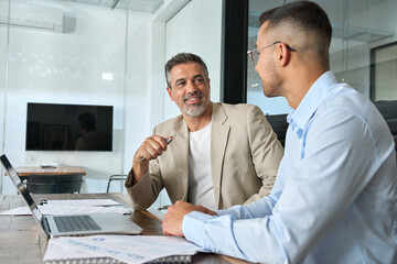 Happy busy professional team of two business men executive having discussion, male partners working...