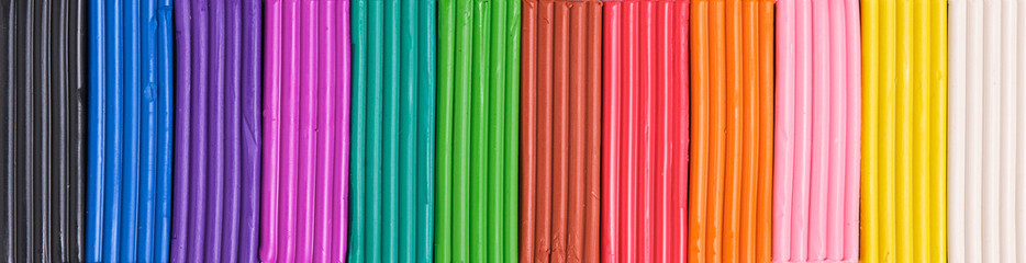 Background made bright multicolored plasticine designed for modeling and creativity.