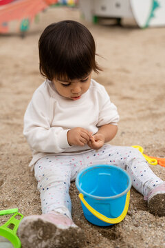Toddler Playing in a Sunny Outdoor Playground