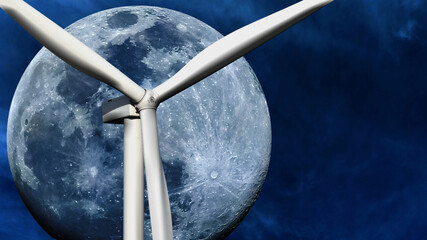 Artistic color photo of wind mill propeller blades against a beautiful full moon and cloudy night...
