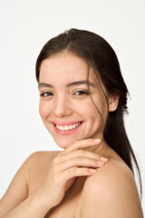 Vertical portrait of happy Hispanic young woman with freckles on face isolated on white background. Beauty aesthetic shot of smiling pretty Latin girl model looking at camera advertising skin care. - obrazy, fototapety, plakaty