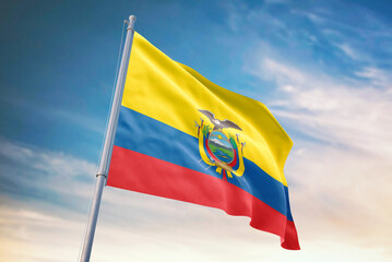 Waving flag of Ecuador in blue sky. Ecuador flag for independence day. The symbol of the state on wavy fabric.