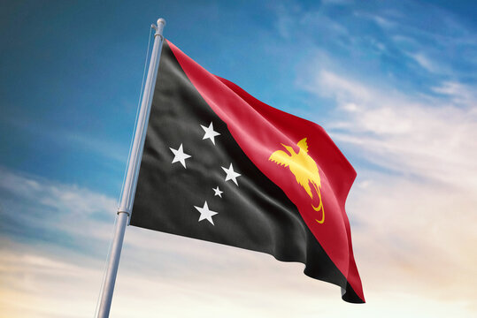 Waving flag of Papua New Guinea in blue sky. Papua New Guinea flag for independence day. The symbol of the state on wavy fabric.