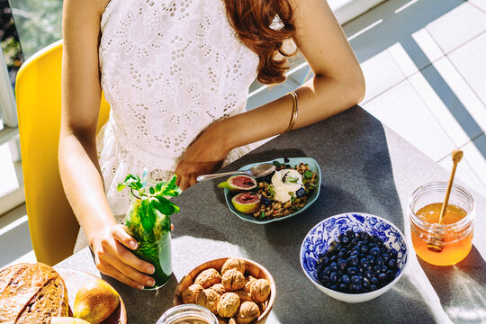 Woman having healthy breakfast