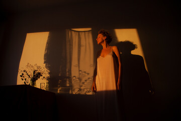 Woman in the sunset light