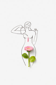 Line drawing of naked woman watering fresh pink gerbera