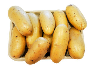 Fresh raw Fingerling potatoes on a tray, isolated