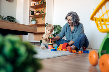Grandmother playing with grandson