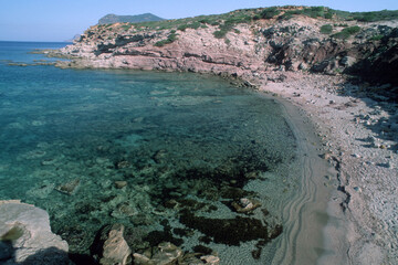beach with sky, Rocky shore. Bay of Porto Ferro. Sardinia, Italy.