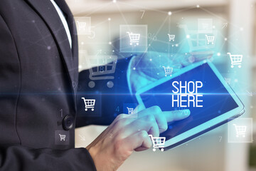 Young person makes a purchase through a tablet