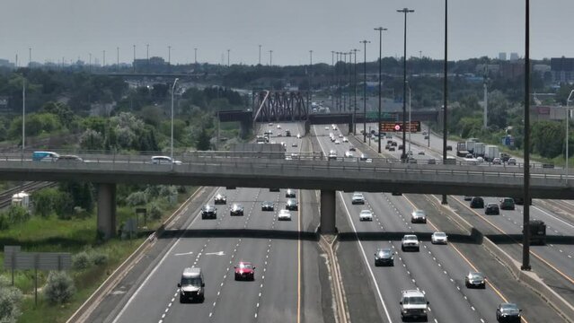 Floating across a major highway, shot east along the 401 in Toronto.