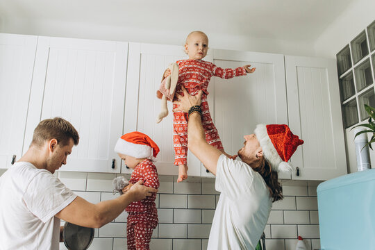 LGBT Family spending time together. Christmas Holidays. Fatherhood.
